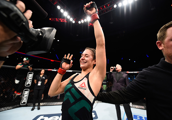 MEXICO CITY, MEXICO - NOVEMBER 05:  Alexa Grasso of Mexico celebrates her victory over Heather Jo Clark of the United States in their women's strawweight bout during the UFC Fight Night event at Arena Ciudad de Mexico on November 5, 2016 in Mexico City, Mexico. (Photo by Jeff Bottari/Zuffa LLC/Zuffa LLC via Getty Images)