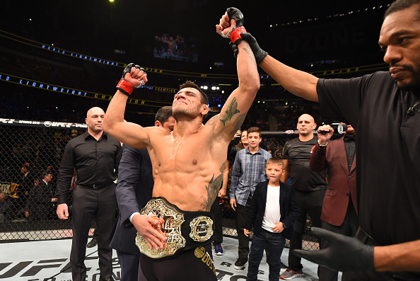 ORLANDO, FL - DECEMBER 19:   Rafael dos Anjos celebrates his TKO victory over Donald Cerrone in their UFC lightweight title bout during the UFC Fight Night event at the Amway Center on December 19, 2015 in Orlando, Florida. (Photo by Josh Hedges/Zuffa LLC/Zuffa LLC via Getty Images)