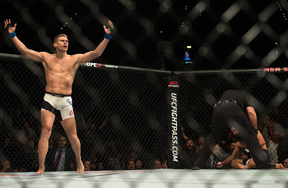 LAS VEGAS, NEVADA - FEBRUARY 06:   (L-R) Stephen Thompson celebrates his knockout victory over Johny Hendricks in their welterweight bout during the UFC Fight Night Las Vegas: Hendricks vs Thompson event inside MGM Grand Garden Arena on February 6, 2016 in Las Vegas Nevada. (Photo by Brandon Magnus/Zuffa LLC/Zuffa LLC via Getty Images)