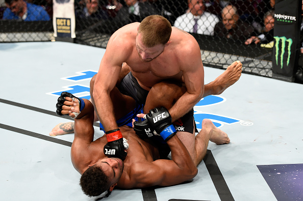 CLEVELAND, OH - SEPTEMBER 10:  Stipe Miocic (top) punches Alistair Overeem of The Netherlands in their UFC heavyweight championship bout during the UFC 203 event at Quicken Loans Arena on September 10, 2016 in Cleveland, Ohio. (Photo by Josh Hedges/Zuffa LLC/Zuffa LLC via Getty Images)
